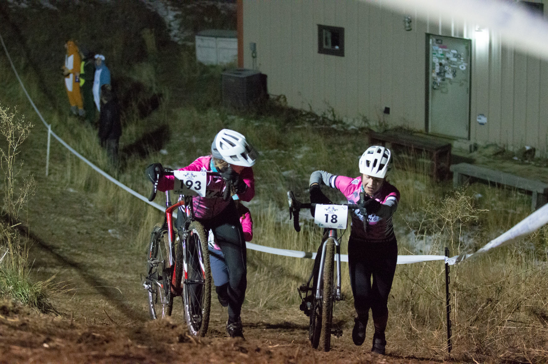 Jamie Terry checks on fellow racer Ellen Davis